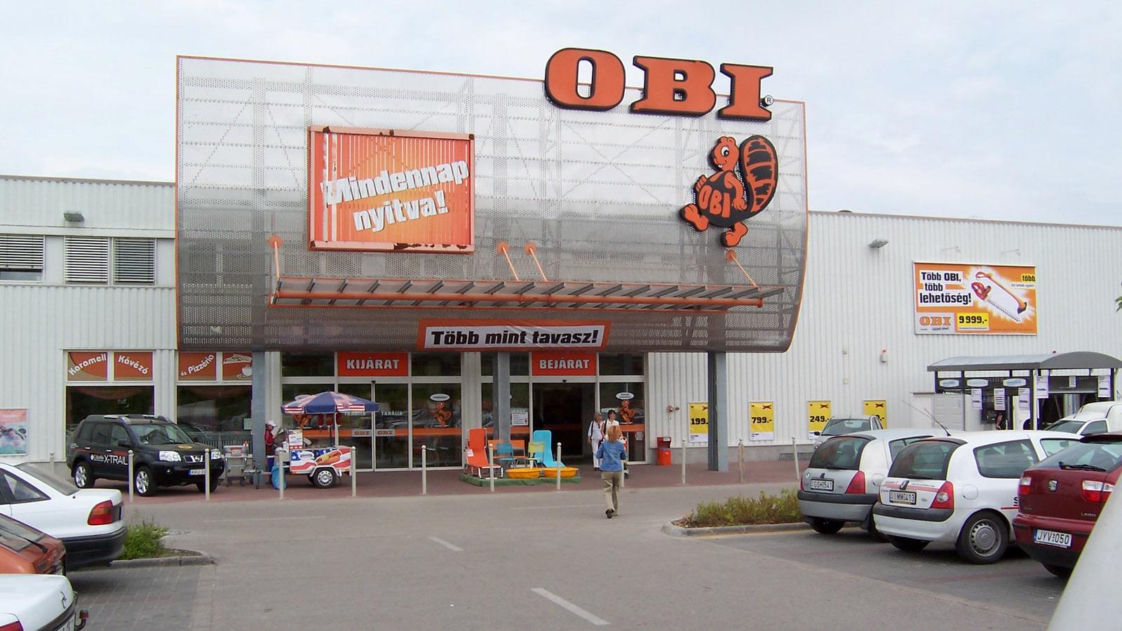 Entrance to OBI DIY store with logo and beaver symbol