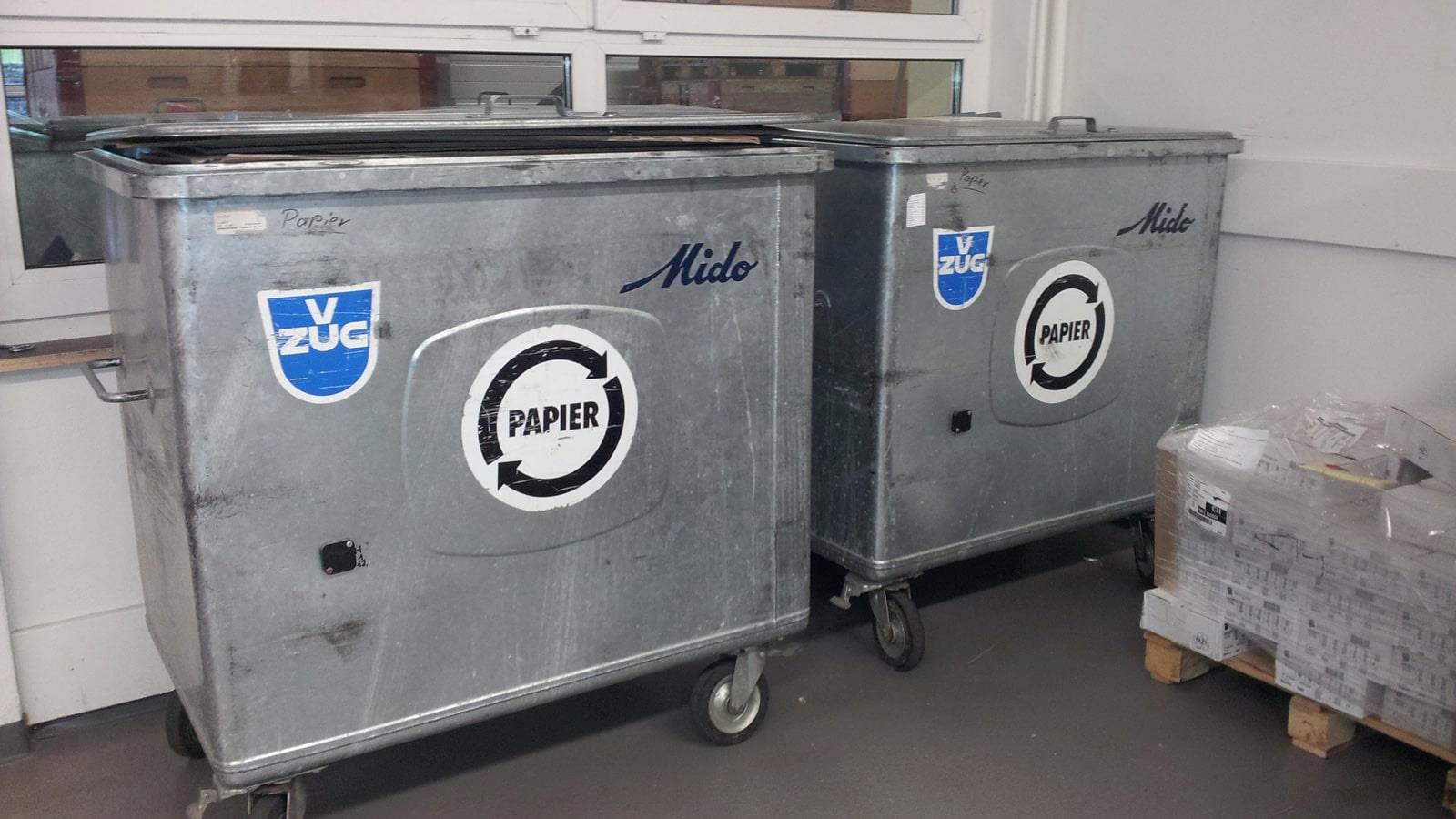 Two metal containers for recyclable paper waste